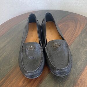 Black leather coach loafer